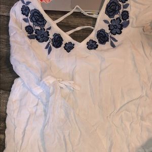 White Hollister shirt with blue flowers